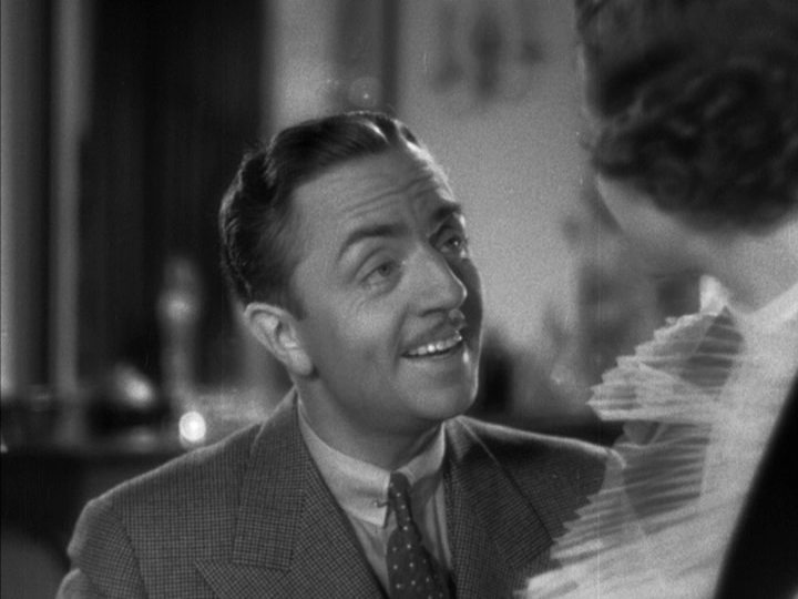 Close-up of Nick querying Nora about her wardrobe