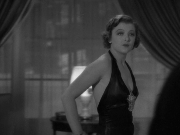 Medium close-up of Nora in her evening gown