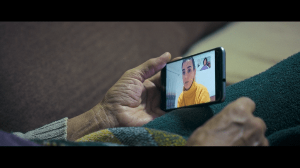 Close-up of the smartphone that Jana is talking to her daughter Ana on