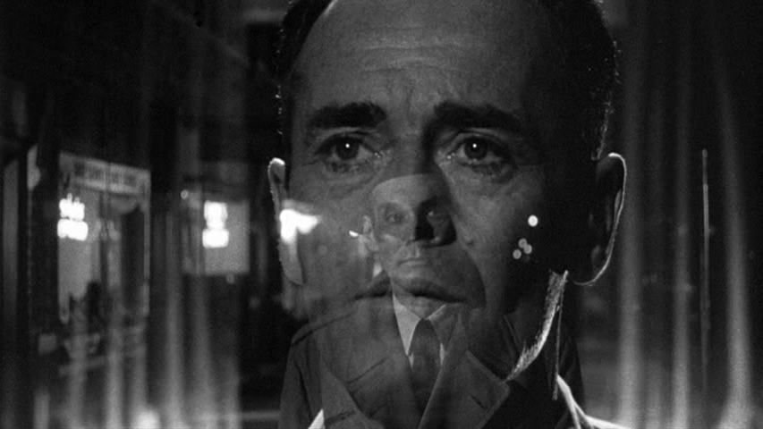 The famous dissolve from a close-up of Henry Fonda's Manny Balestrero praying to a shot of Richard Robbins Guilty Man walking toward the camera