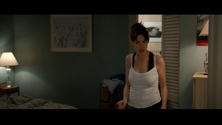 Medium shot of Andy, still ranting