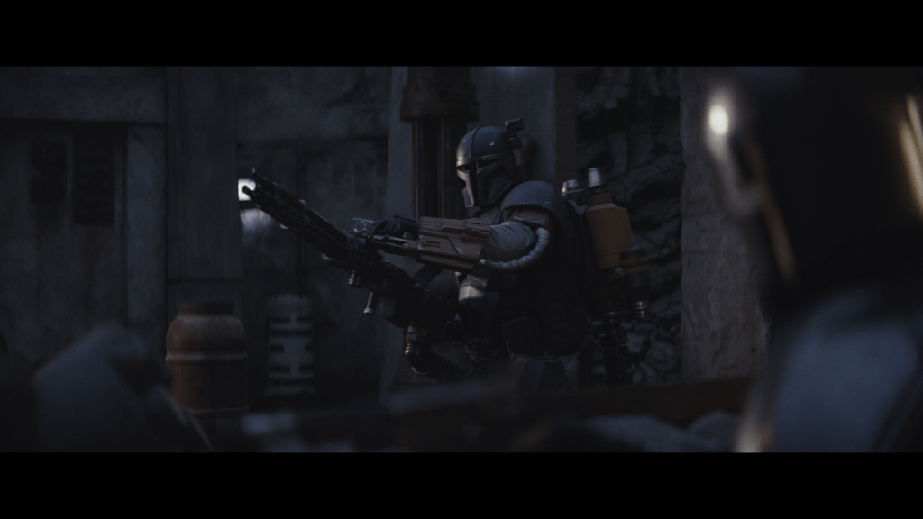 Reverse shot of Heavy Infantry replying to Mando, who is out of focus in the foreground