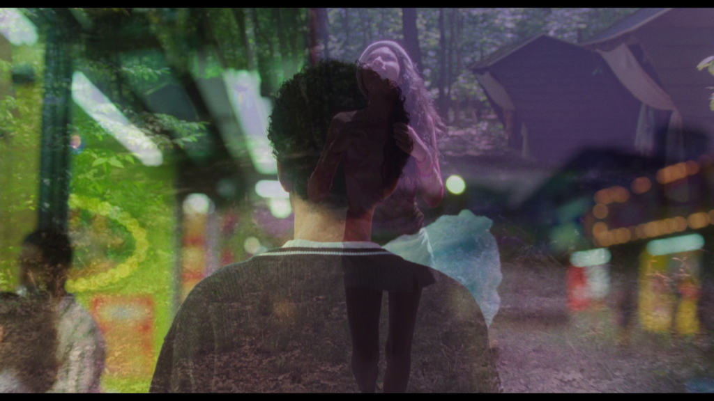 Continuation of the previous shot: the image of Isabel dissolves into one of Owen walking AWAY from the camera