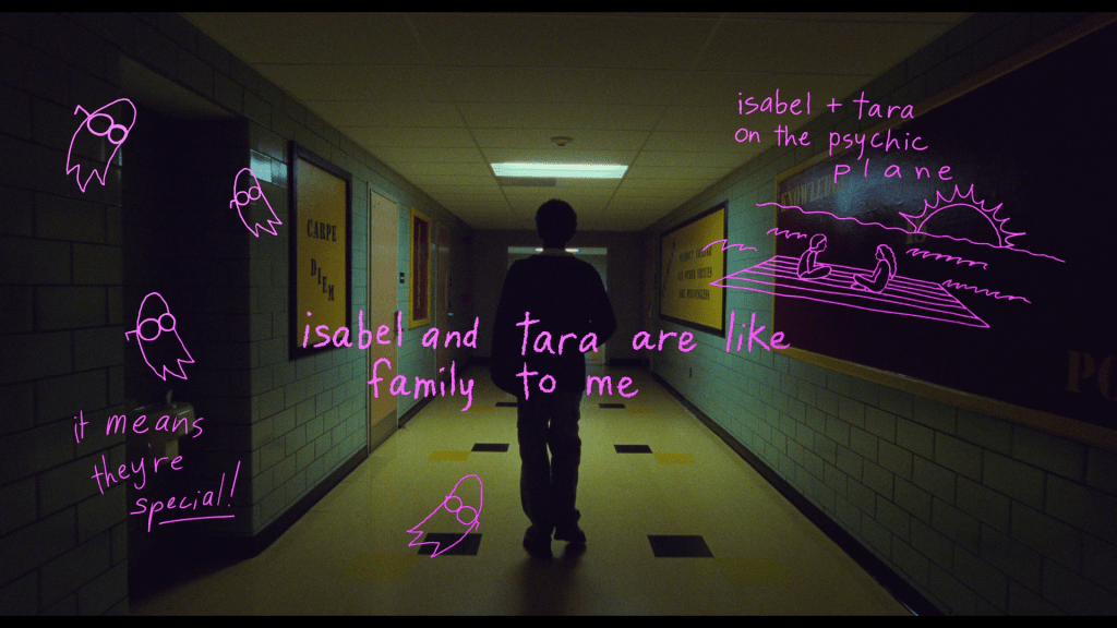 Continuation of the previous image a new set of text and drawings are highlighted by one which reads "Isabel and Tara are like family to me" that occupies the center of the frame
