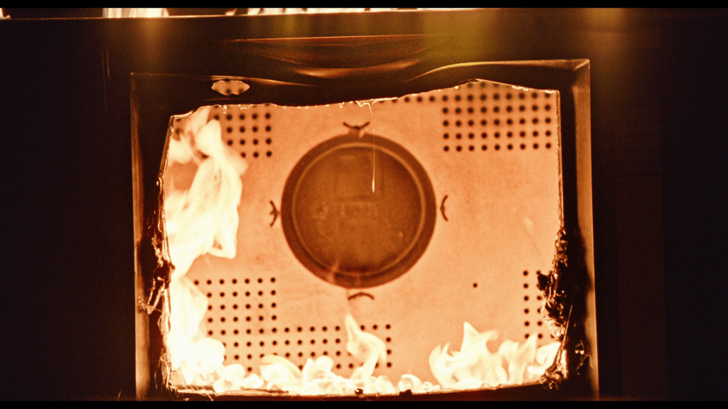 Close-up of a burning TV set