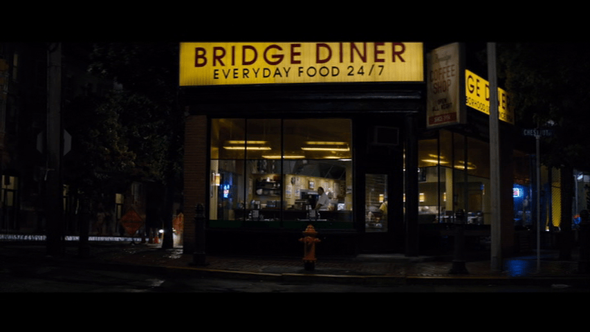 Exterior shot of a diner from The Equalizer which is clearly modeled on Hopper's painting