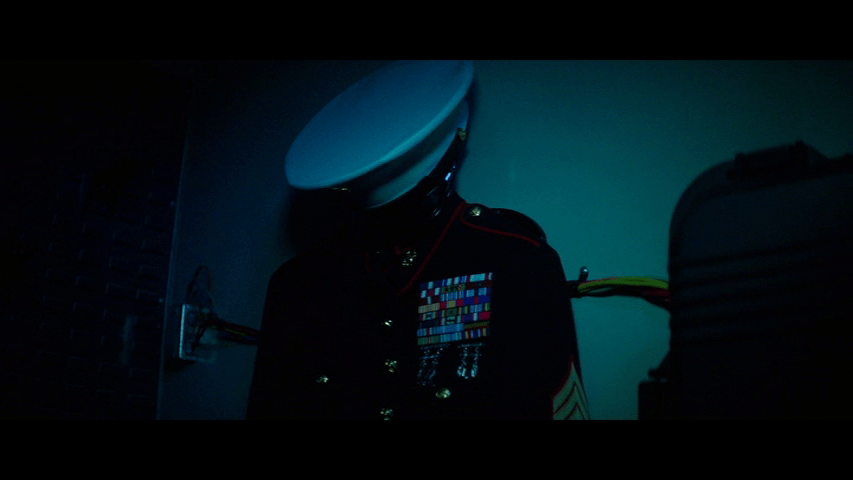Close-up of McCall's military dress uniform from The Equalizer 2, which is replete with awards