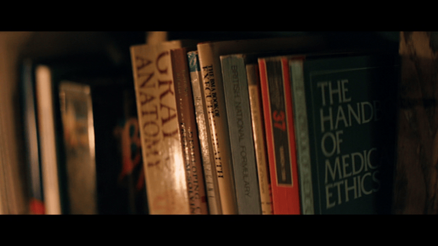 Close-up of a row of medical books